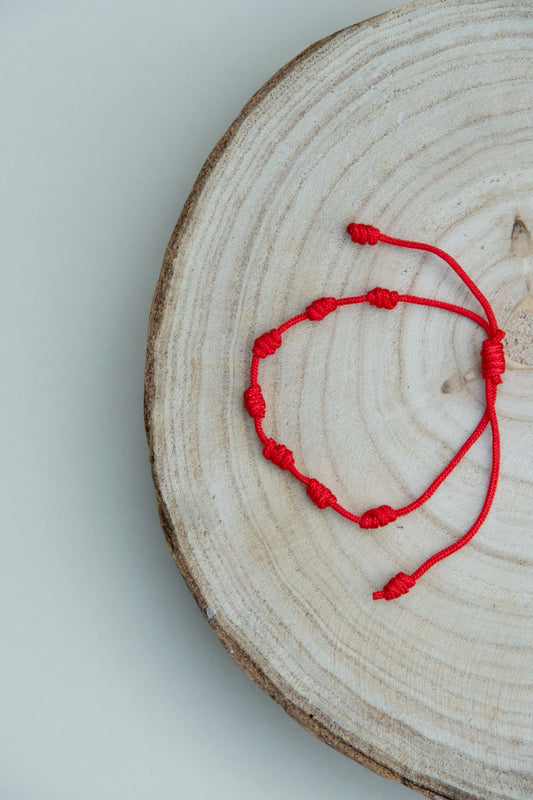 Pulsera roja de 7 nudos – Protección